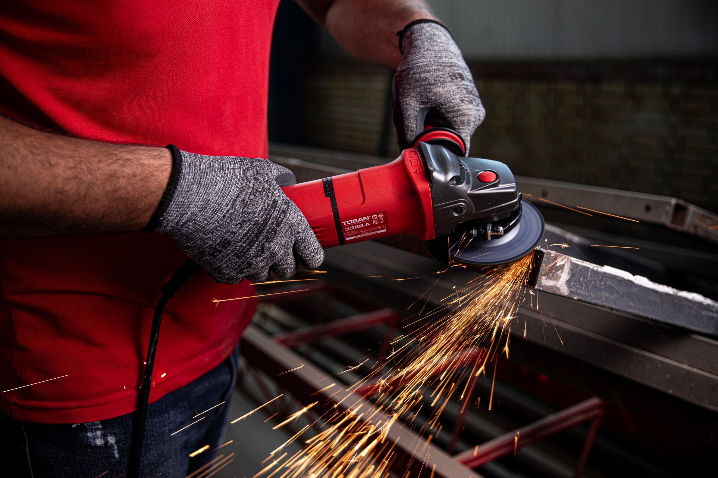 TOSAN angle grinder in industrial use